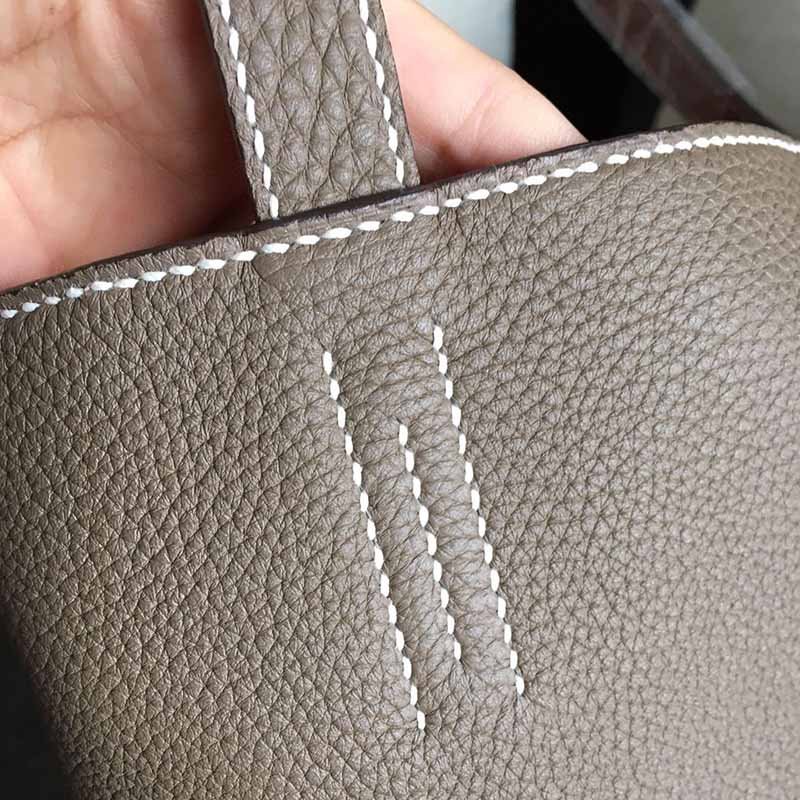 4 how are reinforced leather bag handles made