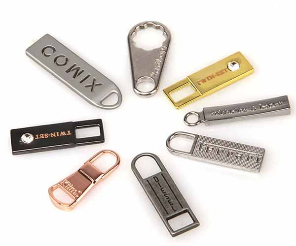 9. zipper puller & hardware logos